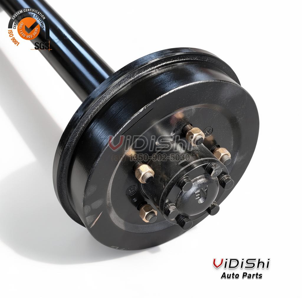 4WD Front and Rear Axle Set with Transfer Case 1 to 2 Ton 5 Close-up of the rear axle drum brake hub end with black drum, zinc-plated wheel nuts and spindle cap
