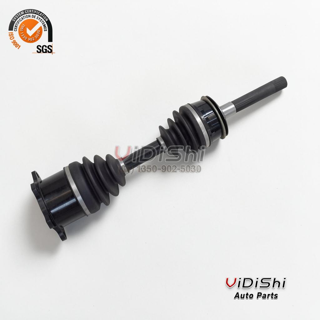 Drive shaft assembly at an angle on white with CV joint boots, a flange end and a spline end