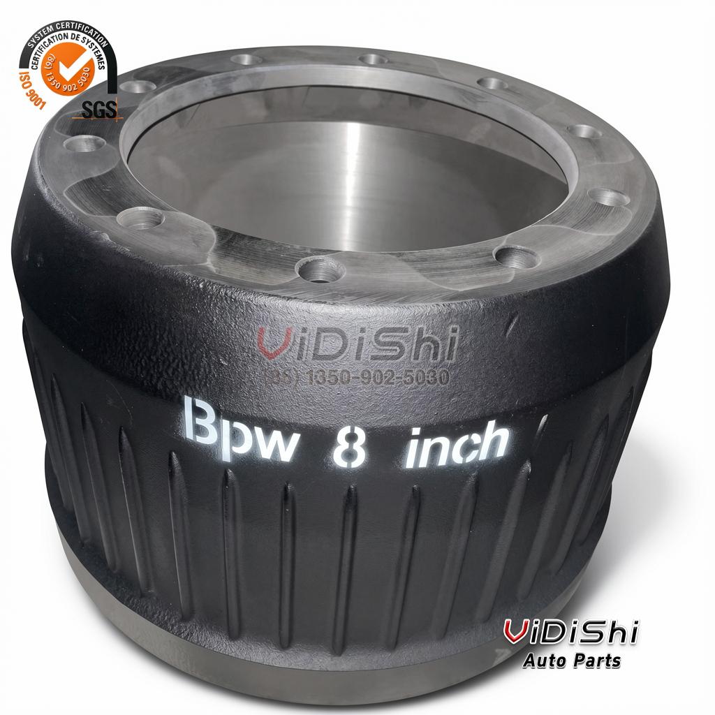 Cast trailer brake drum with ribbed black body, machined drum mouth and white size stencil on the wall