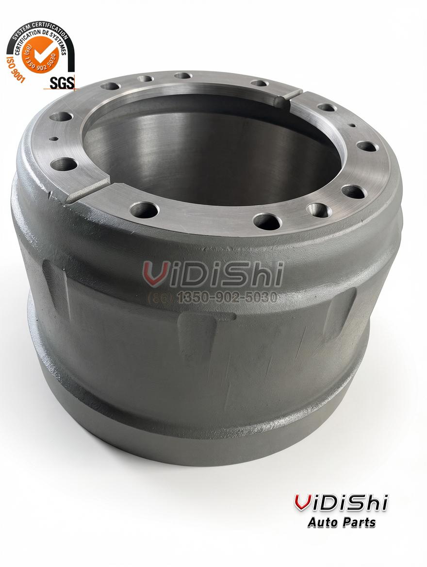 Brake drum with machined flange face, a ring of bolt holes and a rectangular locating slot