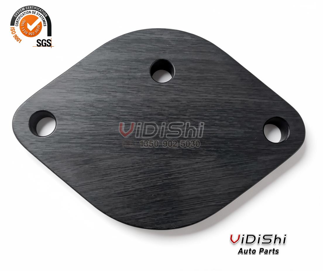 Black anodized oval block-off plate with three mounting holes