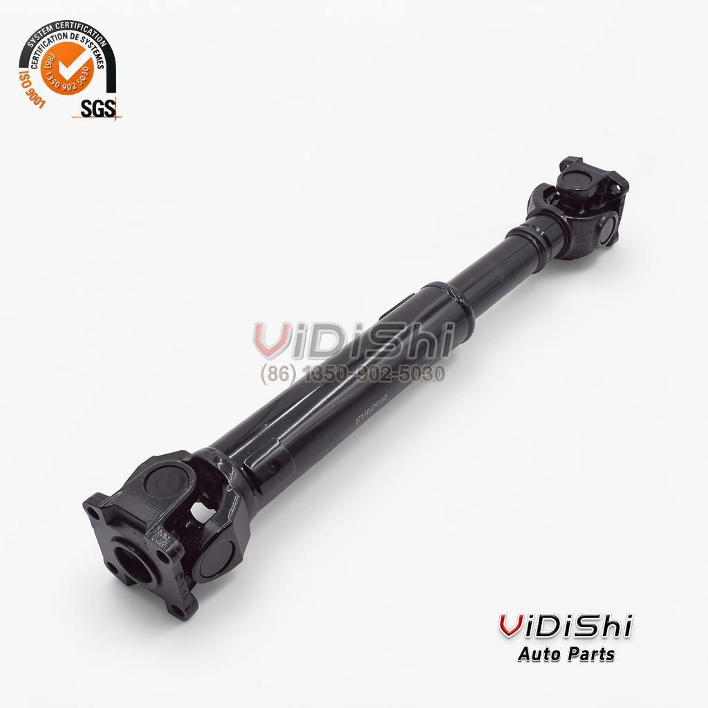 Propeller drive shaft at an angle, black steel tube with center slip joint, four-bolt flange and yoke joint ends