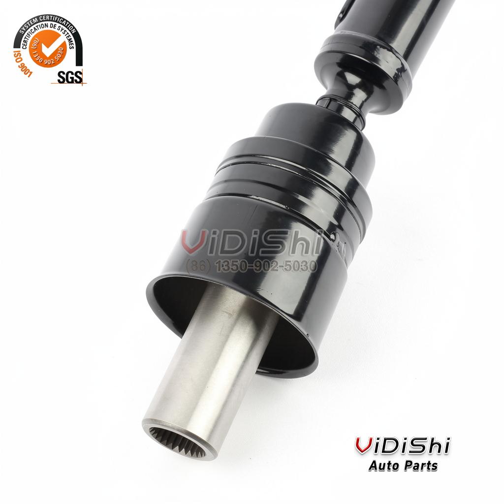 MR580389 Propeller Drive Shaft Replacement for Mitsubishi Pajero 4 Ball cage joint end of the propeller drive shaft close up, black dust cap mouth with bare metal spline stub protruding