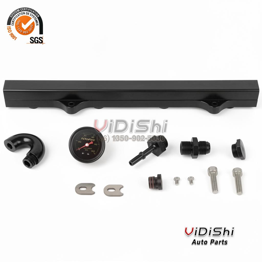 Black fuel rail kit laid out with gauge, fittings and bolts