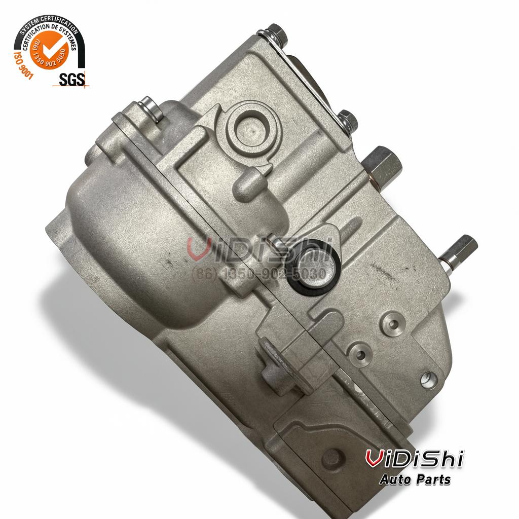 T73208261 mechanical speed governor, grey cast body, stepped top cover, hex plugs and a drive stub at the right