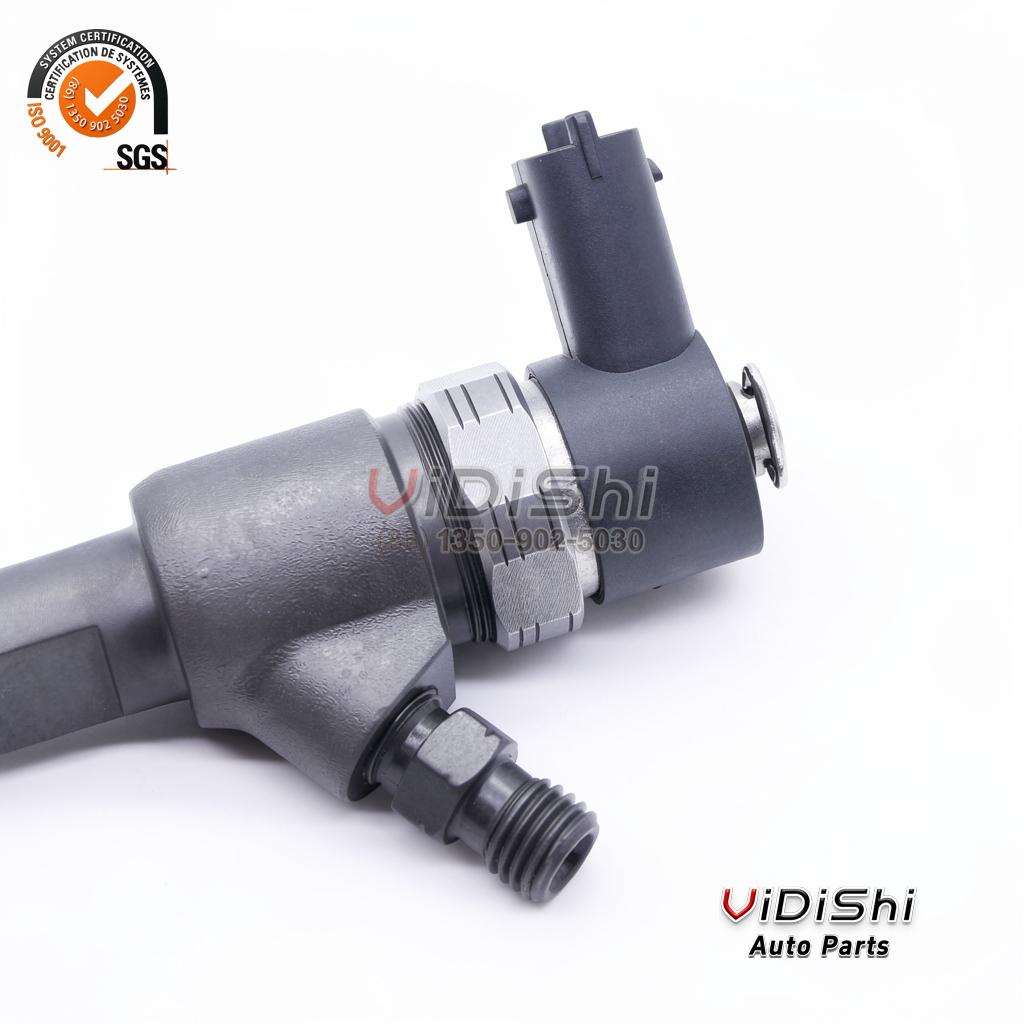 Close view of the solenoid valve and the spade connector on a 0445110291 injector body