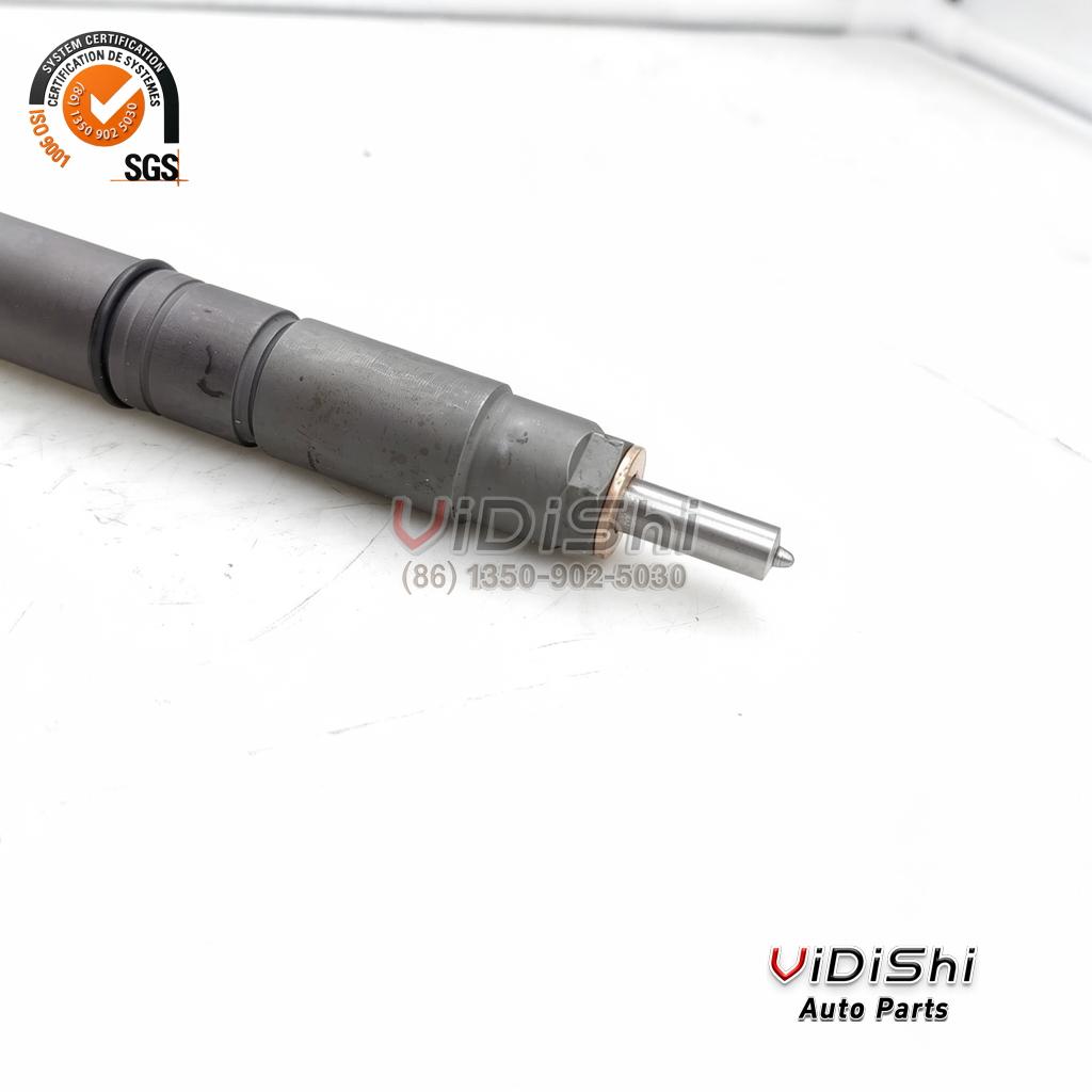 All Products 8 A 0445117077 injector angled with the nozzle nut, the copper washer and the spray tip in view