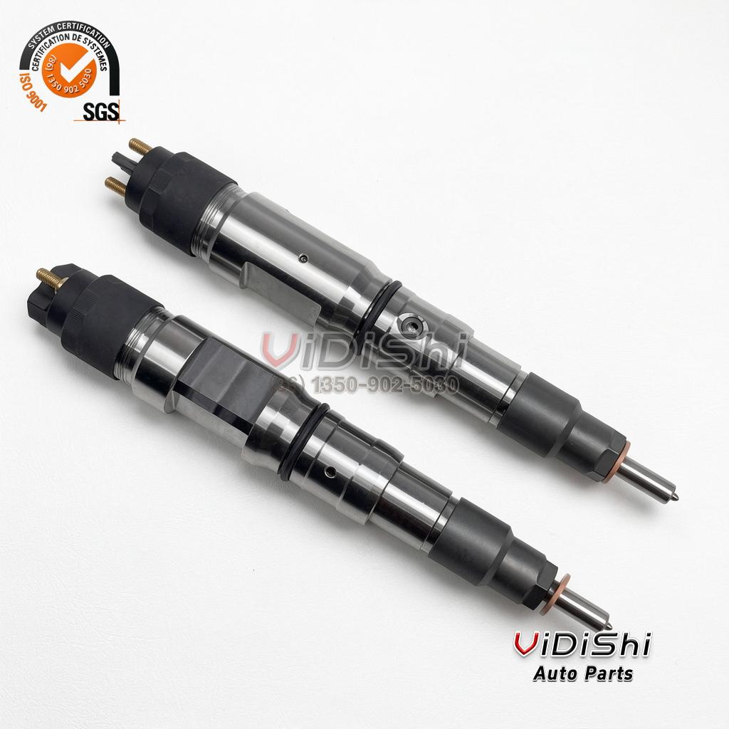 Two 0445120030 injectors lying side by side, showing the control valve body and the solenoid assembly