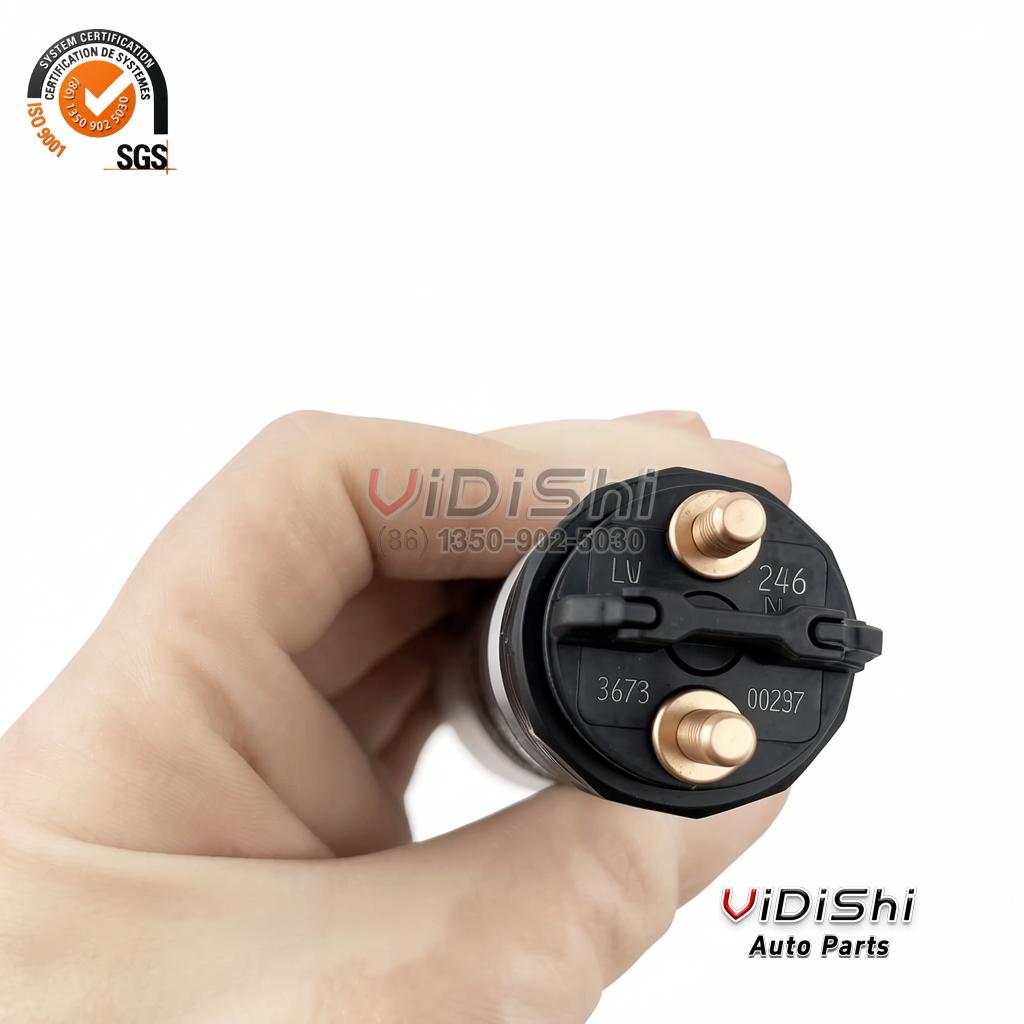 All Products 7 Close view of the solenoid cap of a 0445120246 injector showing the etched 246 code