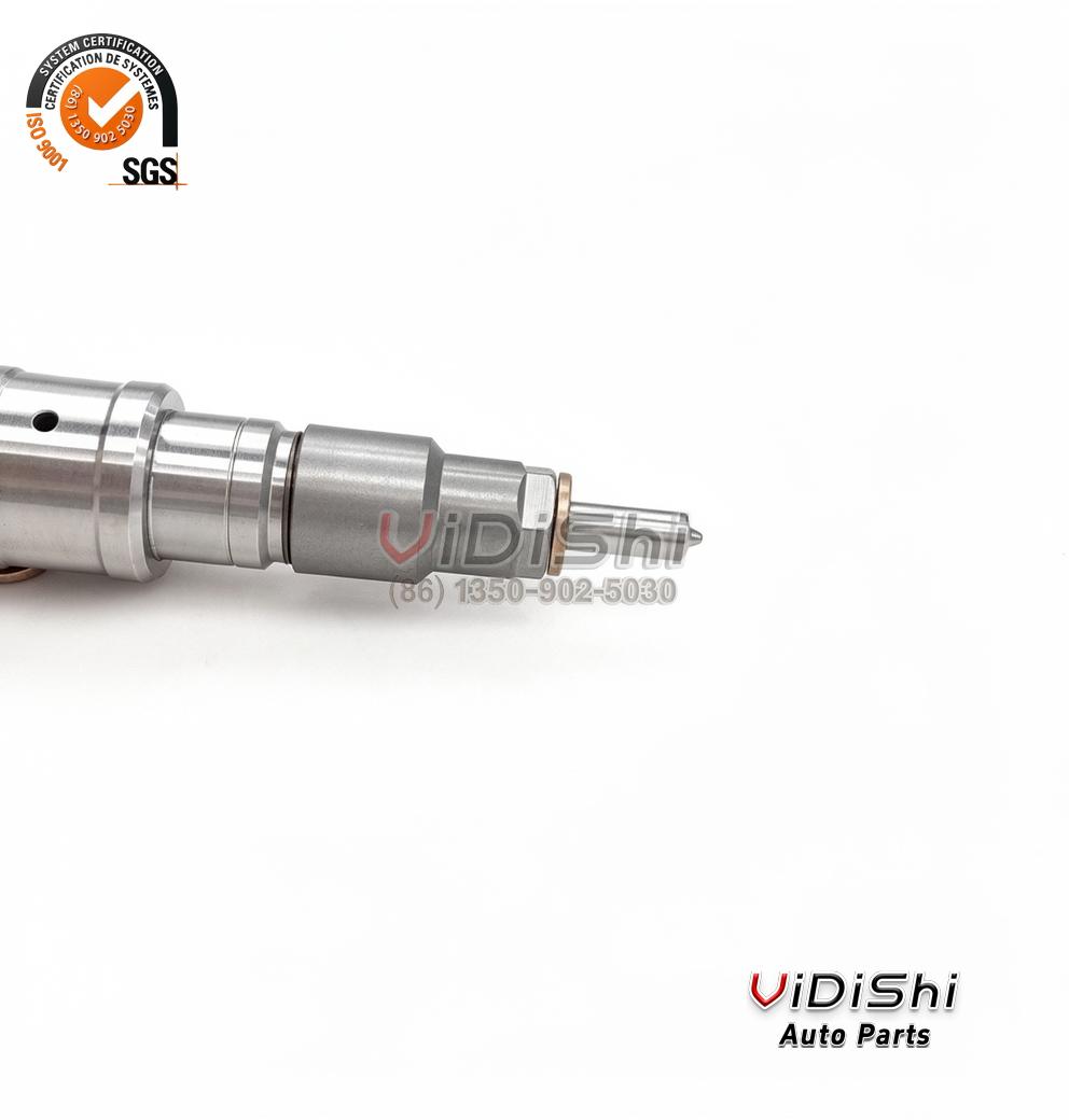 The nozzle end of a 0445120486 injector with its copper sealing washer in view
