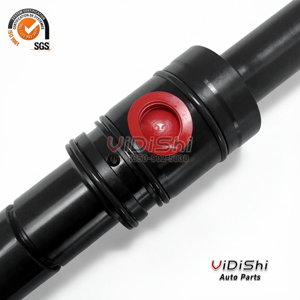 All Products 7 Close view of the red sealed port on a 323X1003-1 fuel injector body, a moulded 22 marking inside the red cap