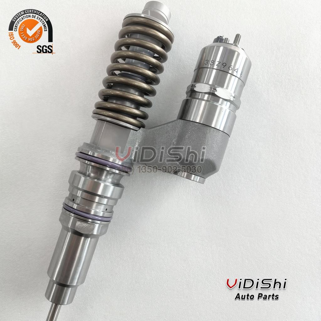 A 3829644 unit injector diagonal on white, nozzle end lower left and the coiled plunger spring up to the top coupling