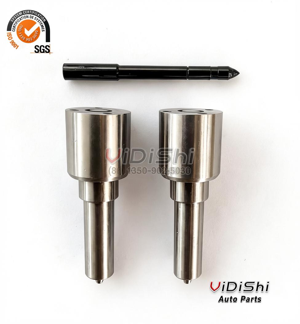 Two DLLA142P1595 injector nozzles standing upright with a needle valve laid across the top