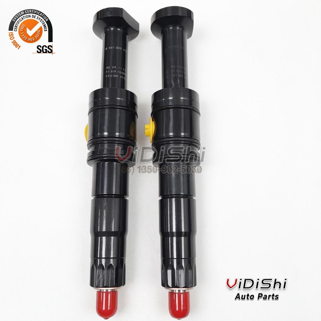 Two F00BL0J050 fuel injectors standing side by side with their stamped bodies facing the camera