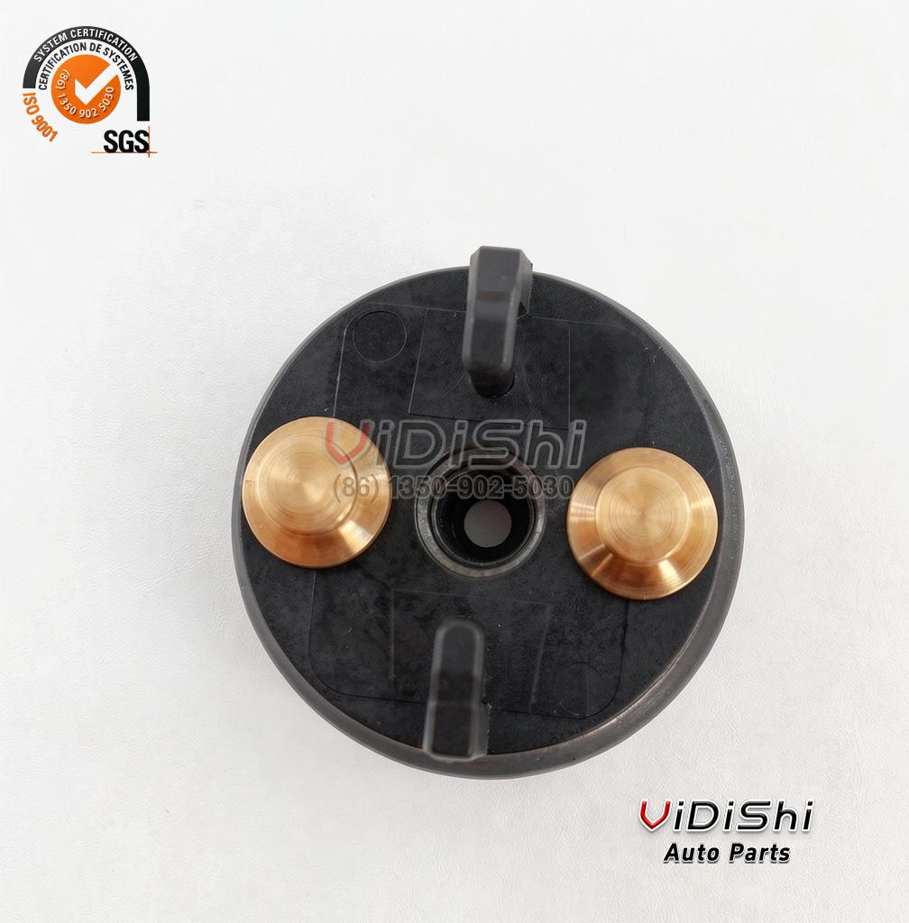 F00RJ02702 Injector Solenoid Valve for Bosch 120 Series 4 F00RJ02702 solenoid valve seen from the terminal end with two brass studs and a central locating bore