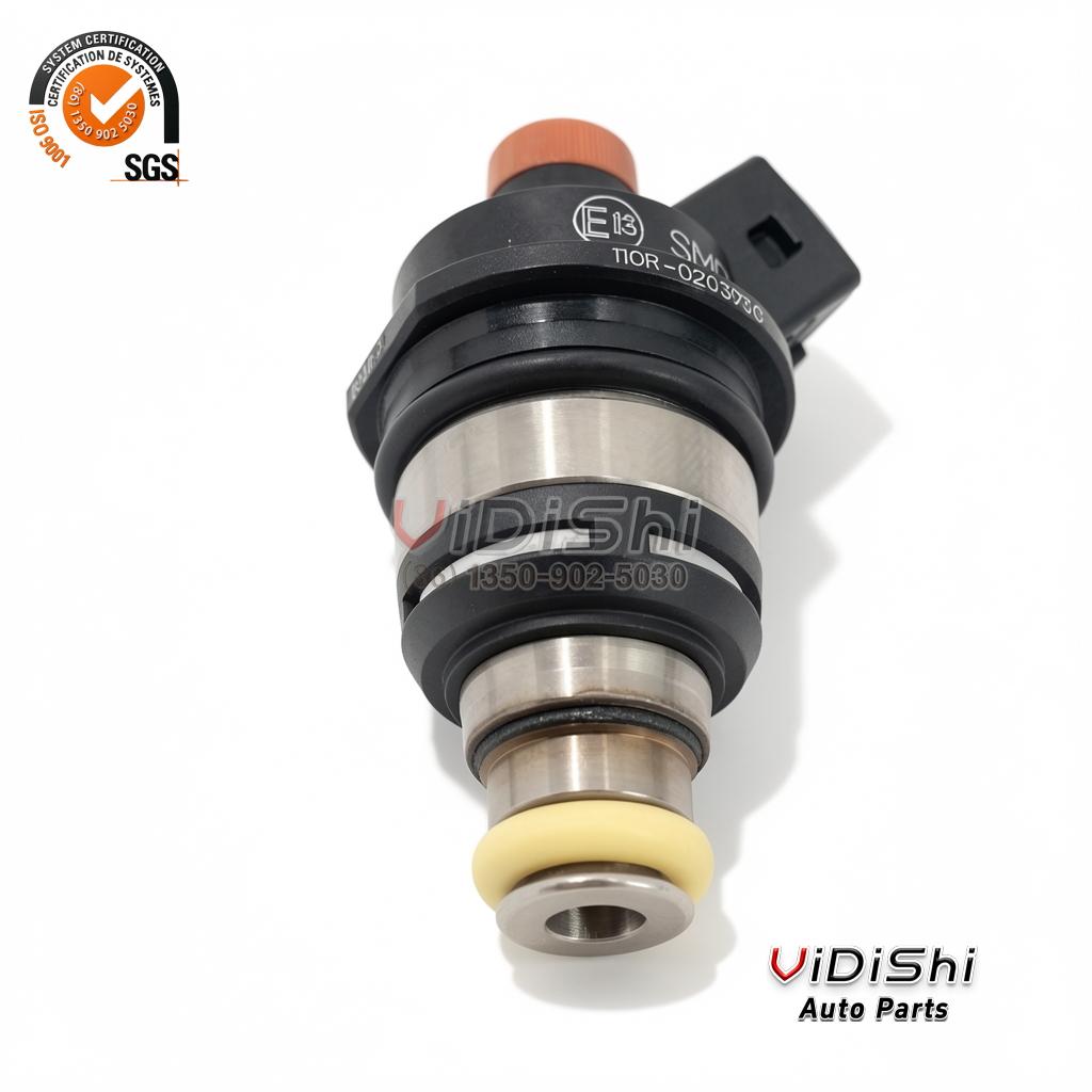 All Products 7 1001101111 Three-quarter view of the nozzle with an orange top cap and a yellow O-ring nose
