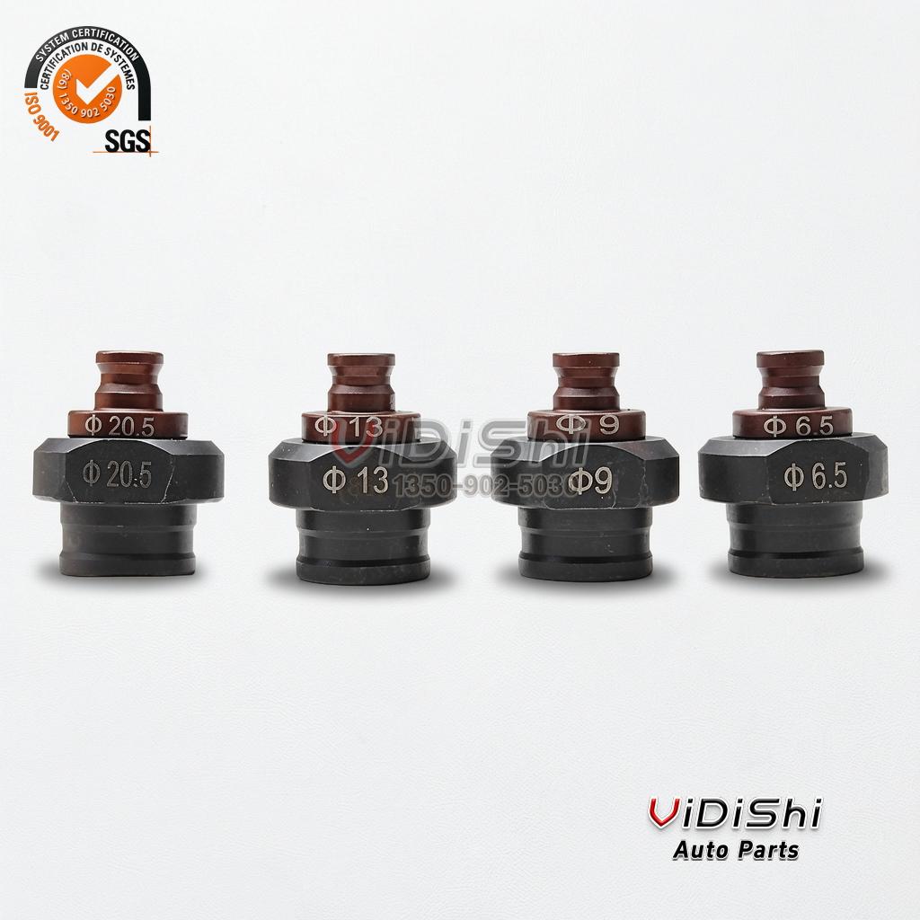 The four standard punch dies laid out with their diameters marked